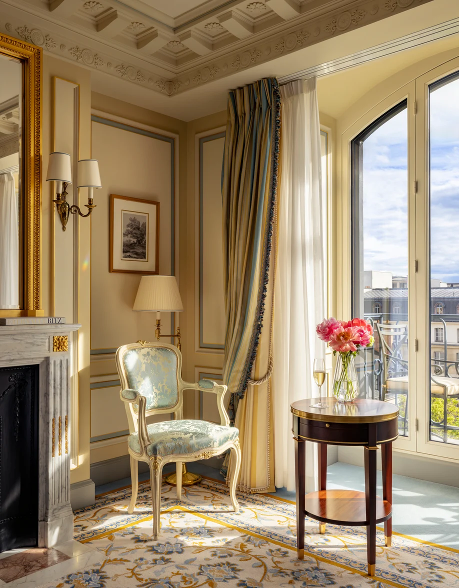 Window with an armchair in an Executive Suite at the Ritz Paris