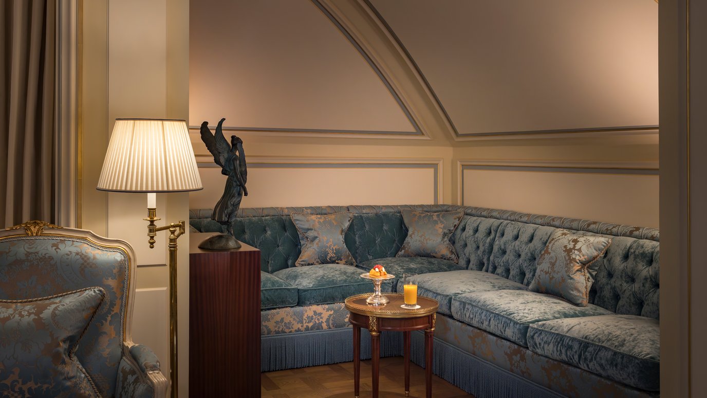 Sofa area of the Prestige Mansart Suite at the Ritz Paris