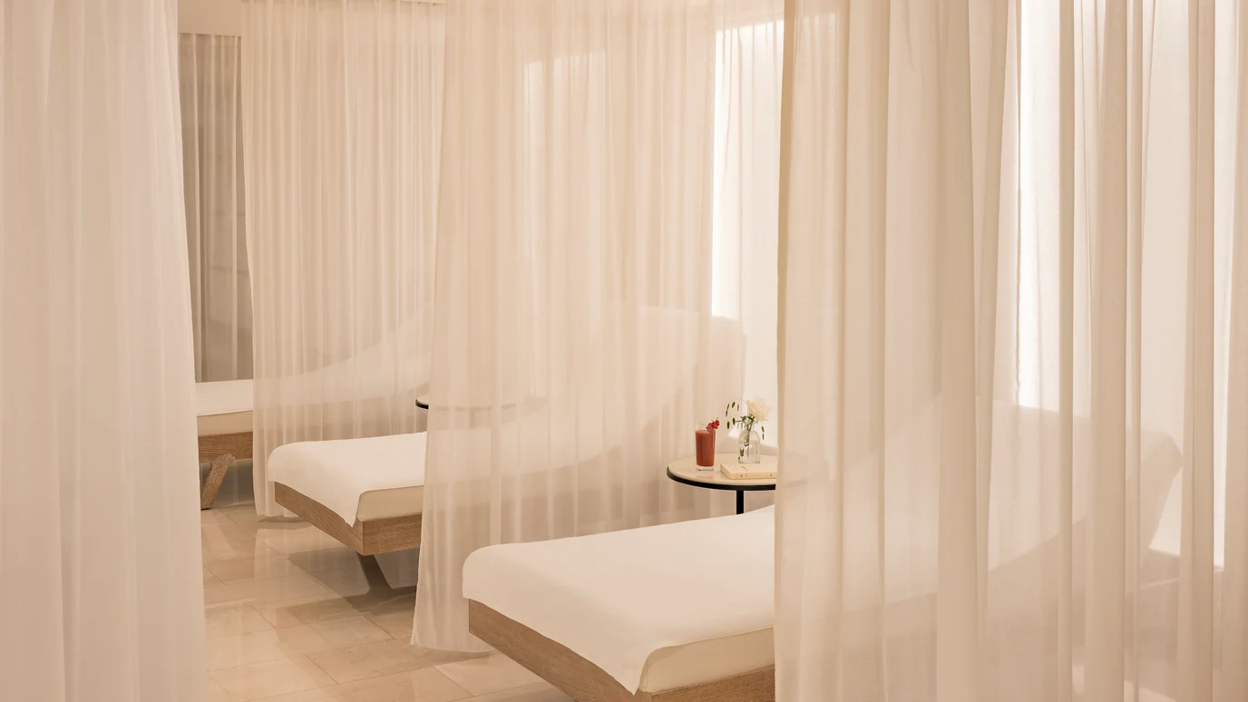 Lounge chairs in the relaxation area of the Ritz Club & Spa
