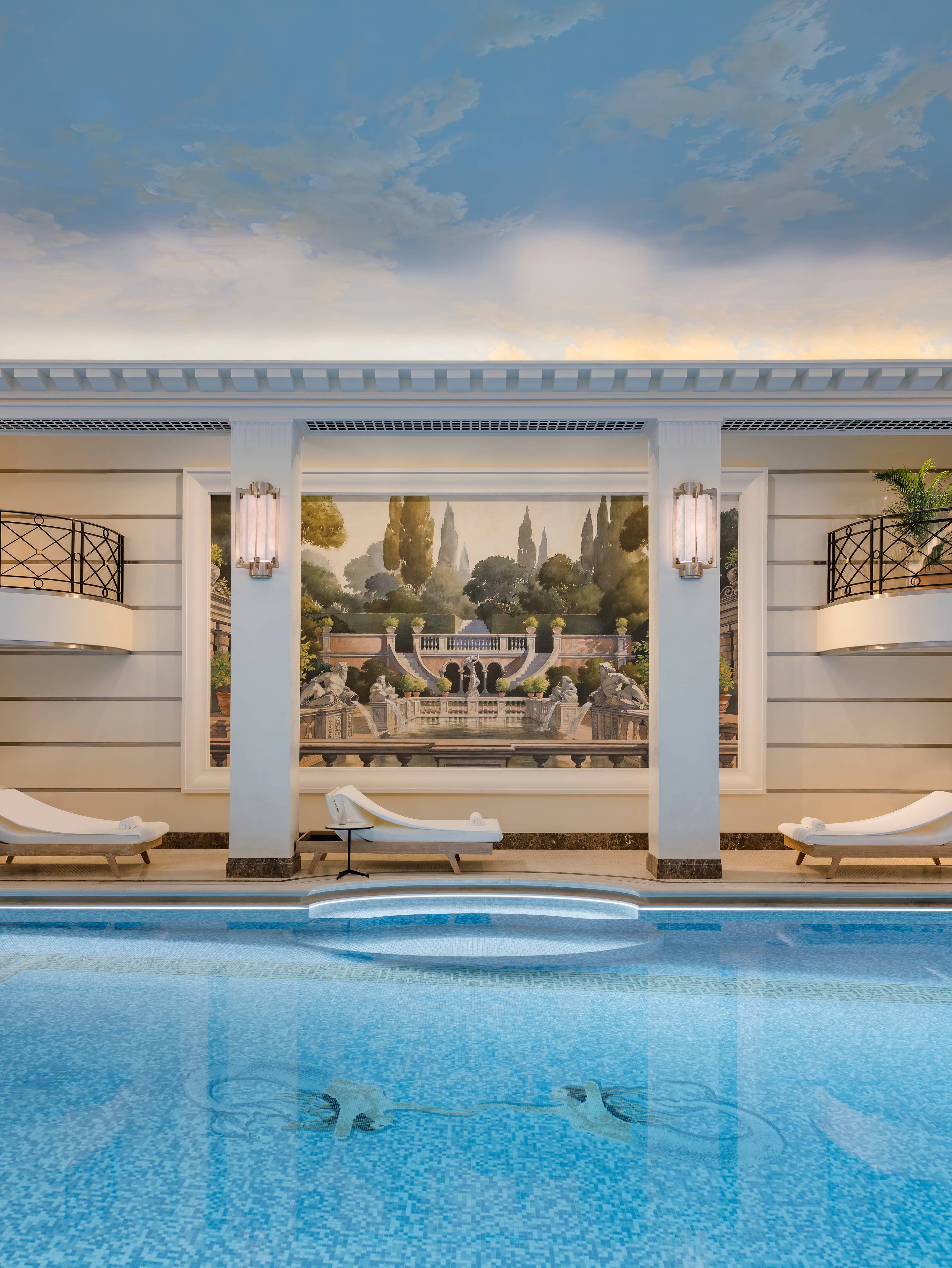 Swimming pool and painting at the Ritz Club & Spa