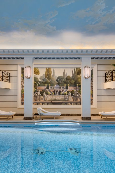 Swimming pool and painting at the Ritz Club & Spa