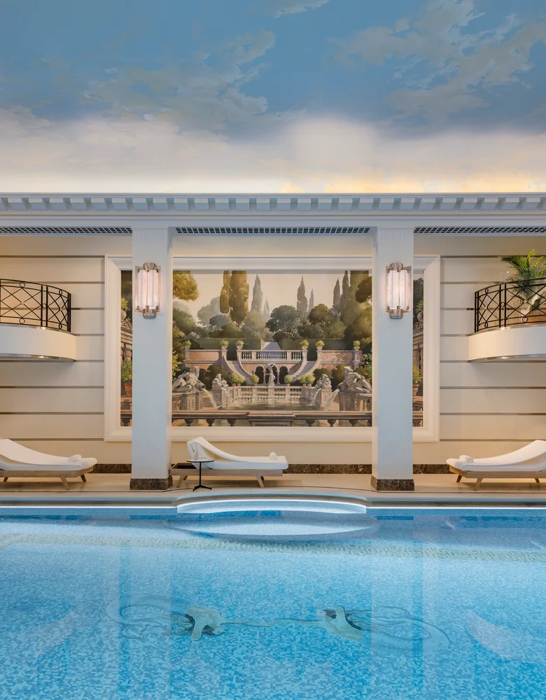 Swimming pool and painting at the Ritz Club & Spa