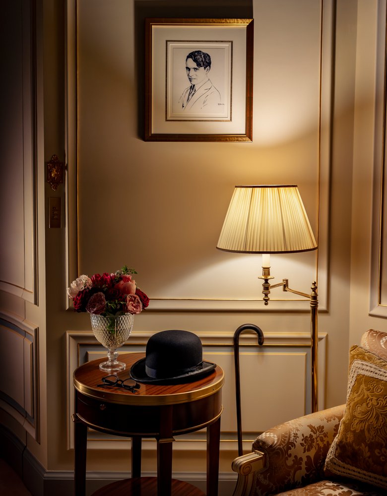 Console with an iconic hat in the Prestige Charlie Chaplin Suite at the Ritz Paris