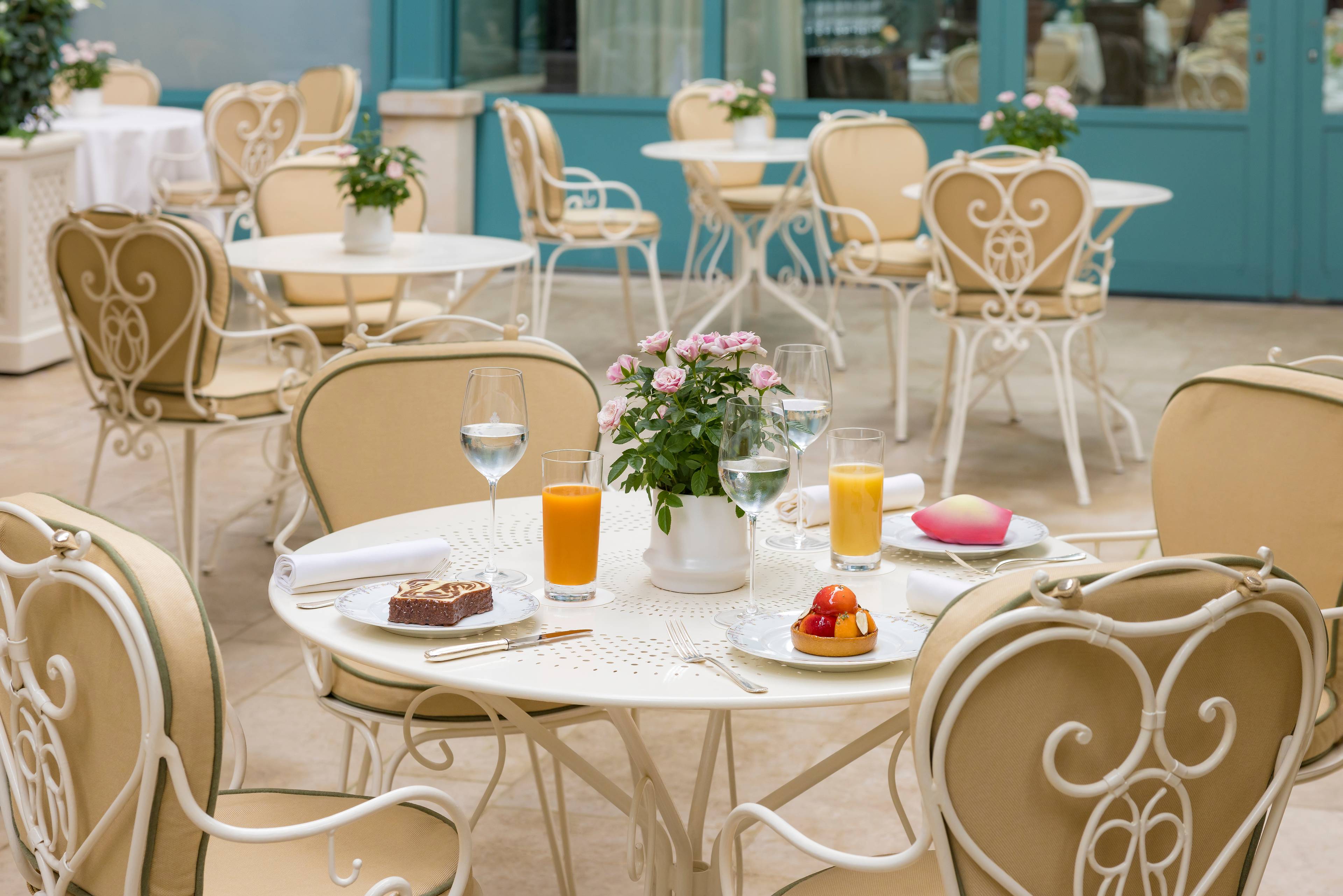 Pastries and fruit juices on the terrace of the Bar Vendôme at the Ritz Paris