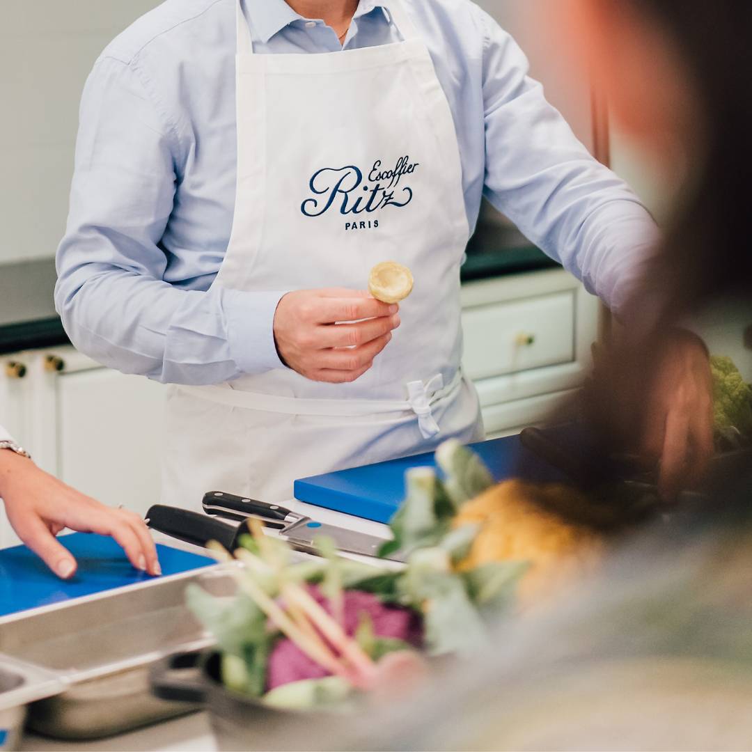 Participant wearing the Ecole Ritz Escoffier apron