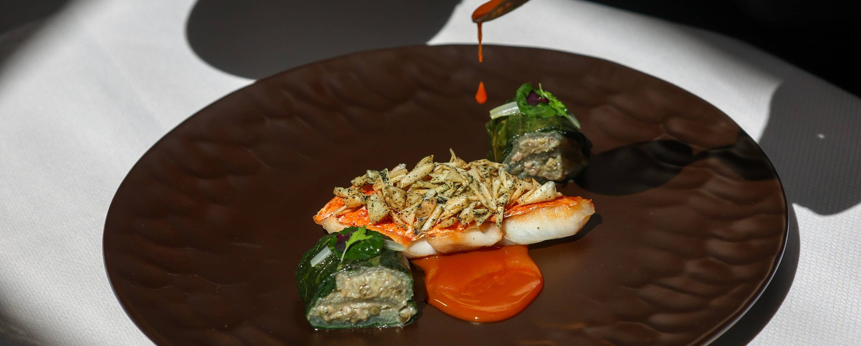 Scaled scorpionfish with grapefruit and kale