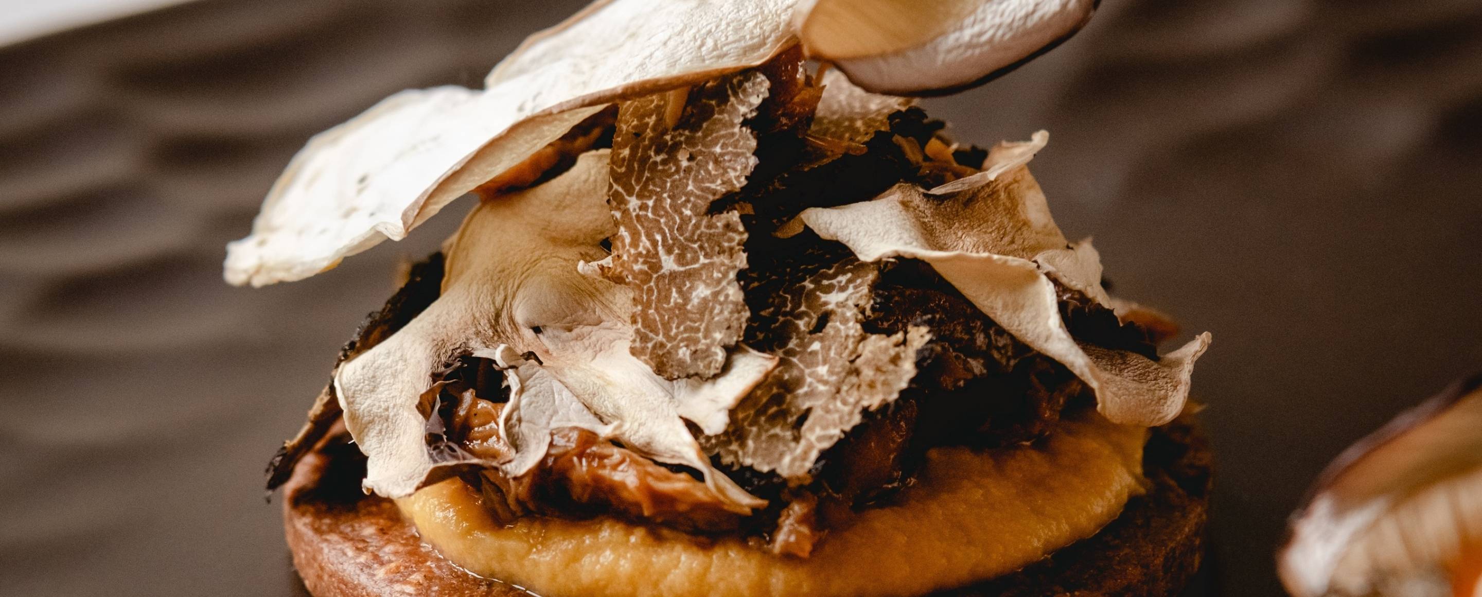 Free-range guinea fowl supreme with vin jaune and wild mushrooms in poultry jus
