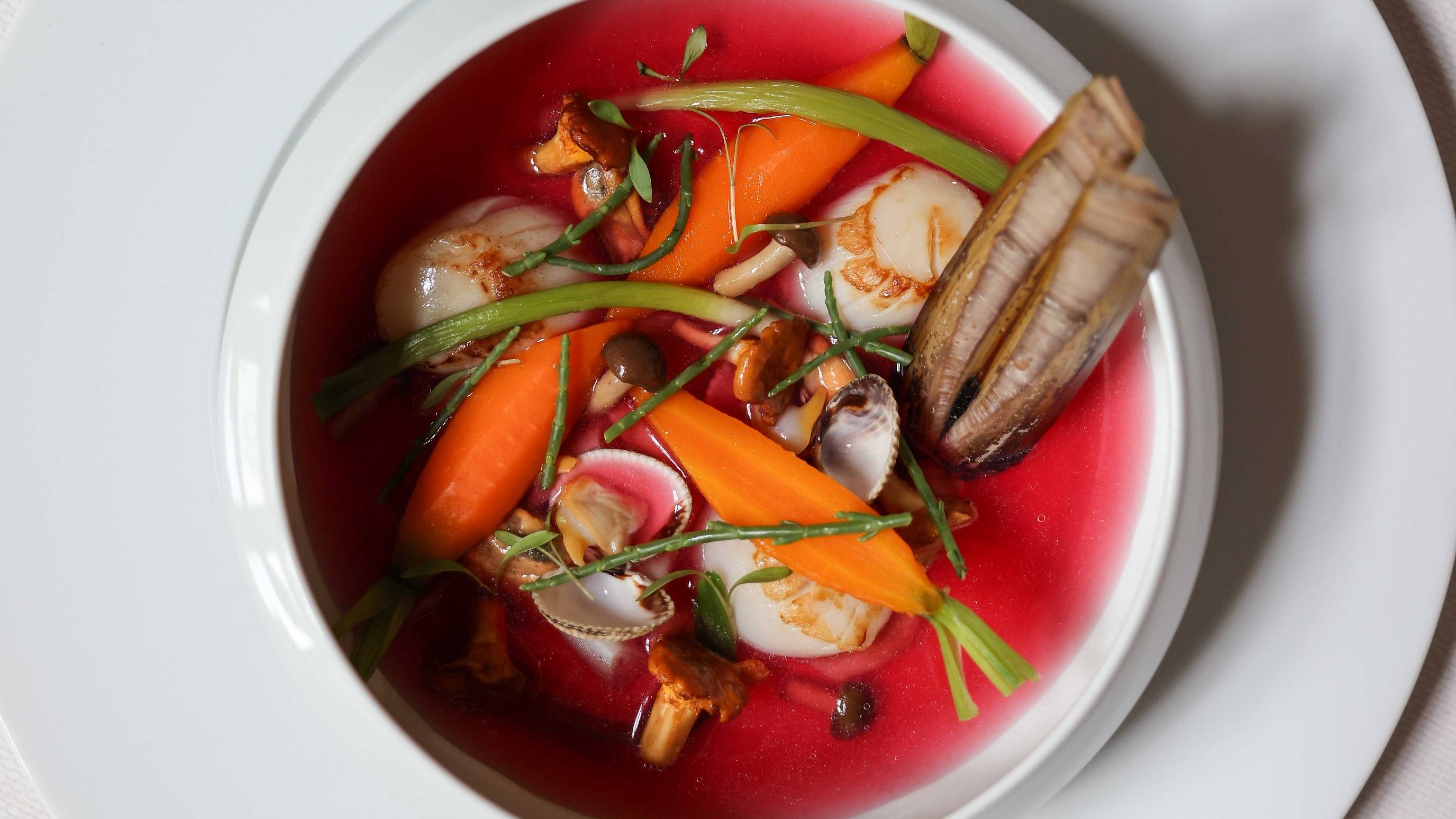 Shellfish consommé with seaweed