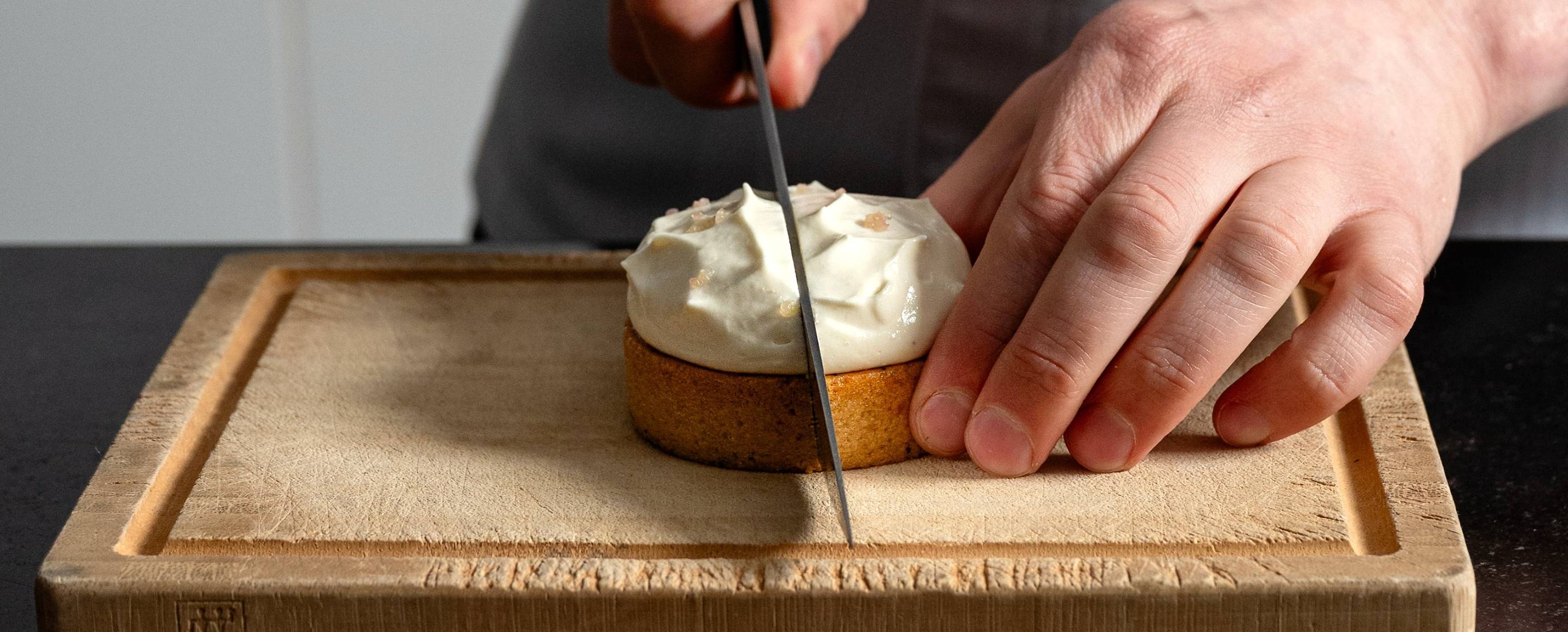 Slicing a lemon meringue tart