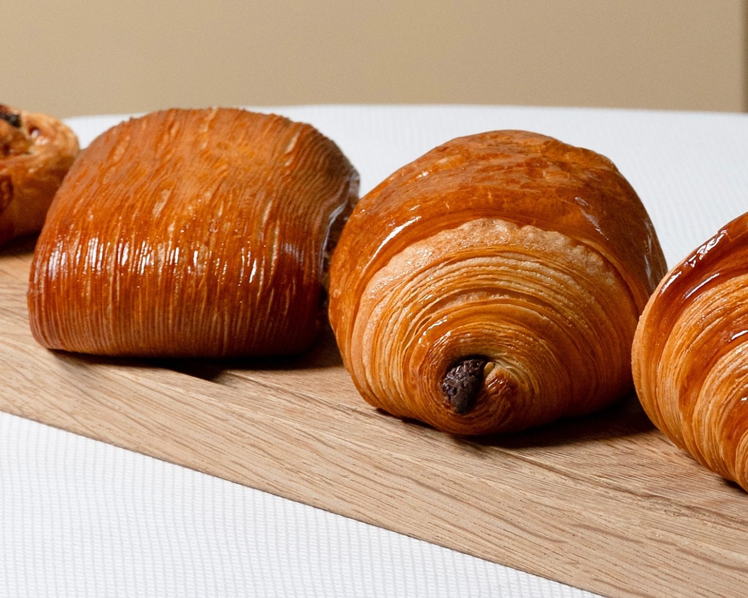 Assorted viennoiseries: croissant, pain au chocolat, pain suisse, pain aux raisins
