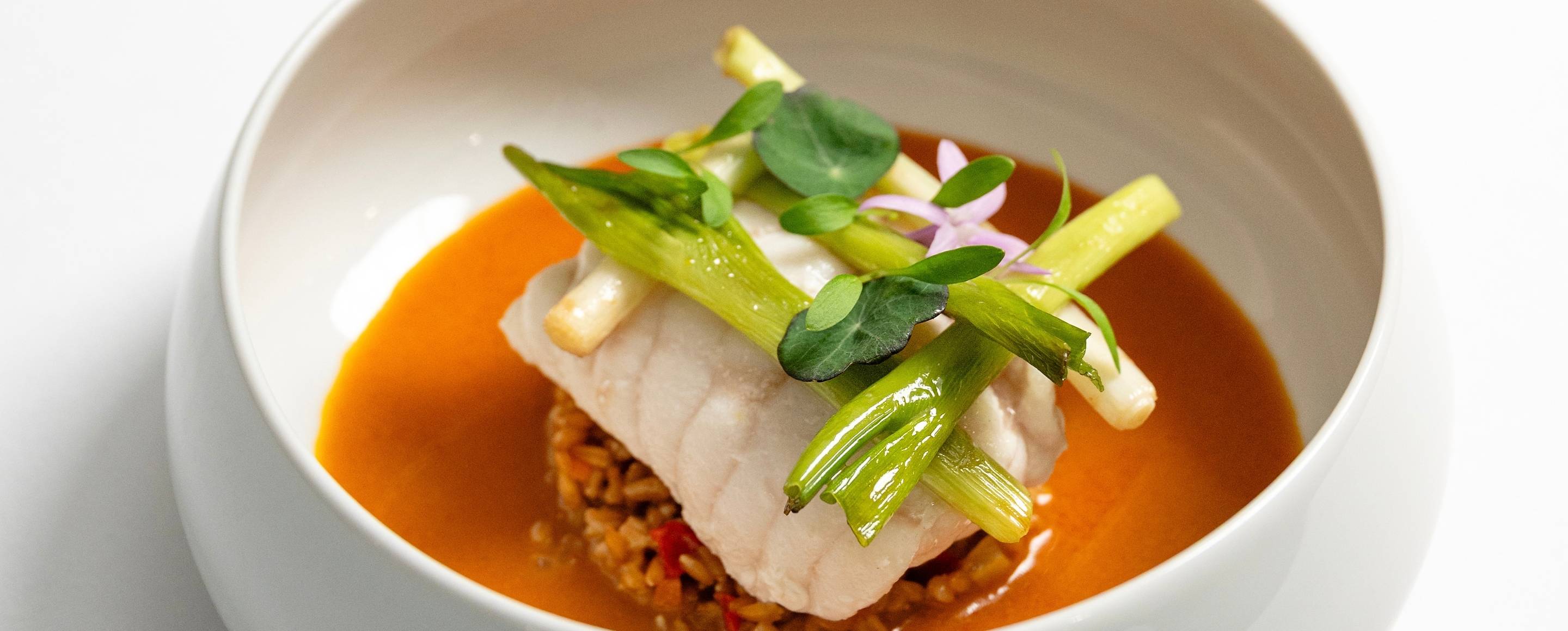 Shellfish consommé with seaweed