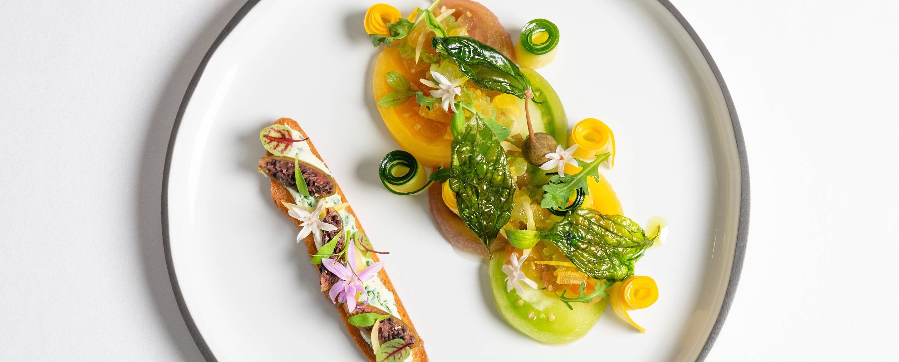 Heirloom tomato salad with garlic toast and ewe’s cheese