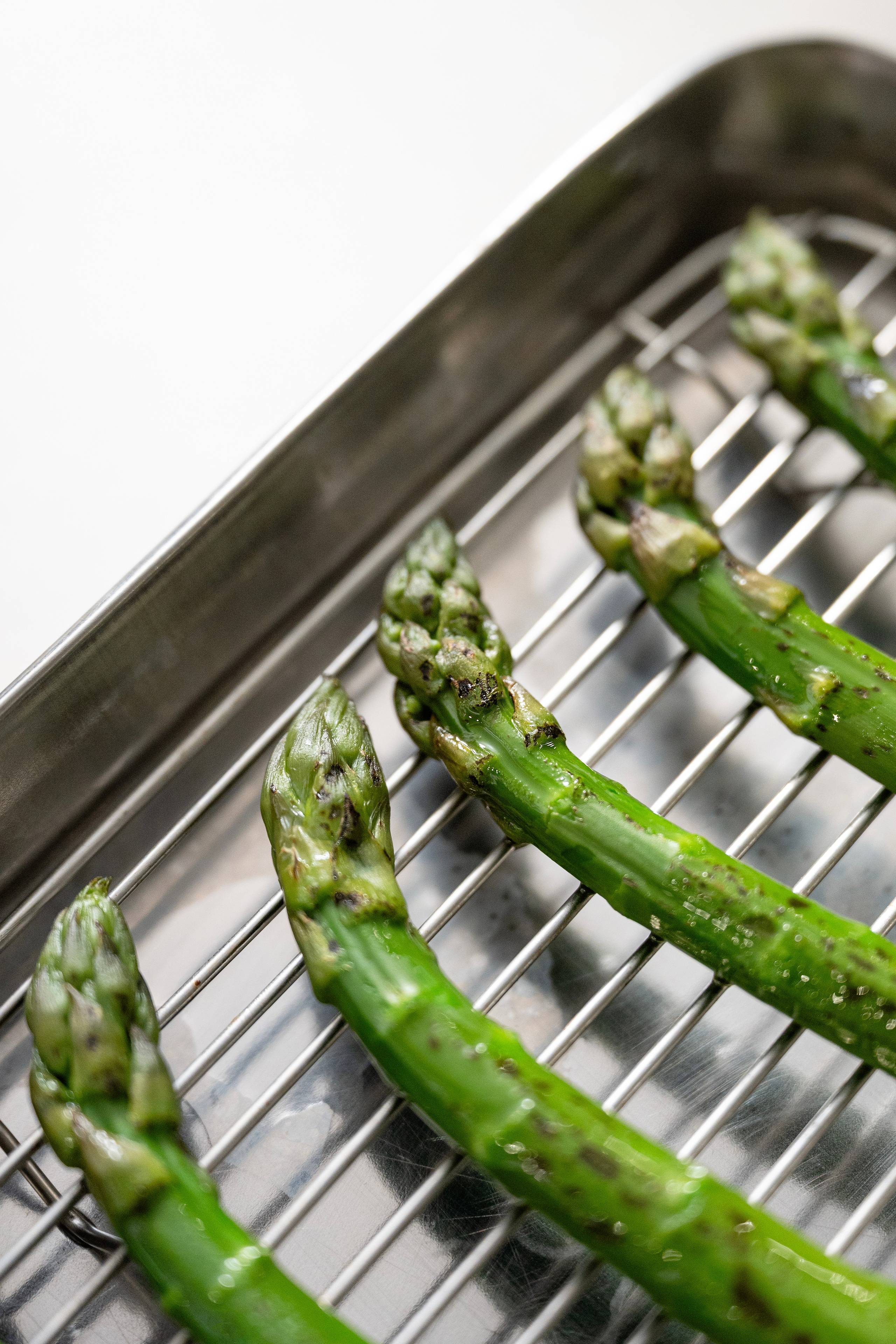 Grilled green asparagus with wild garlic sabayon