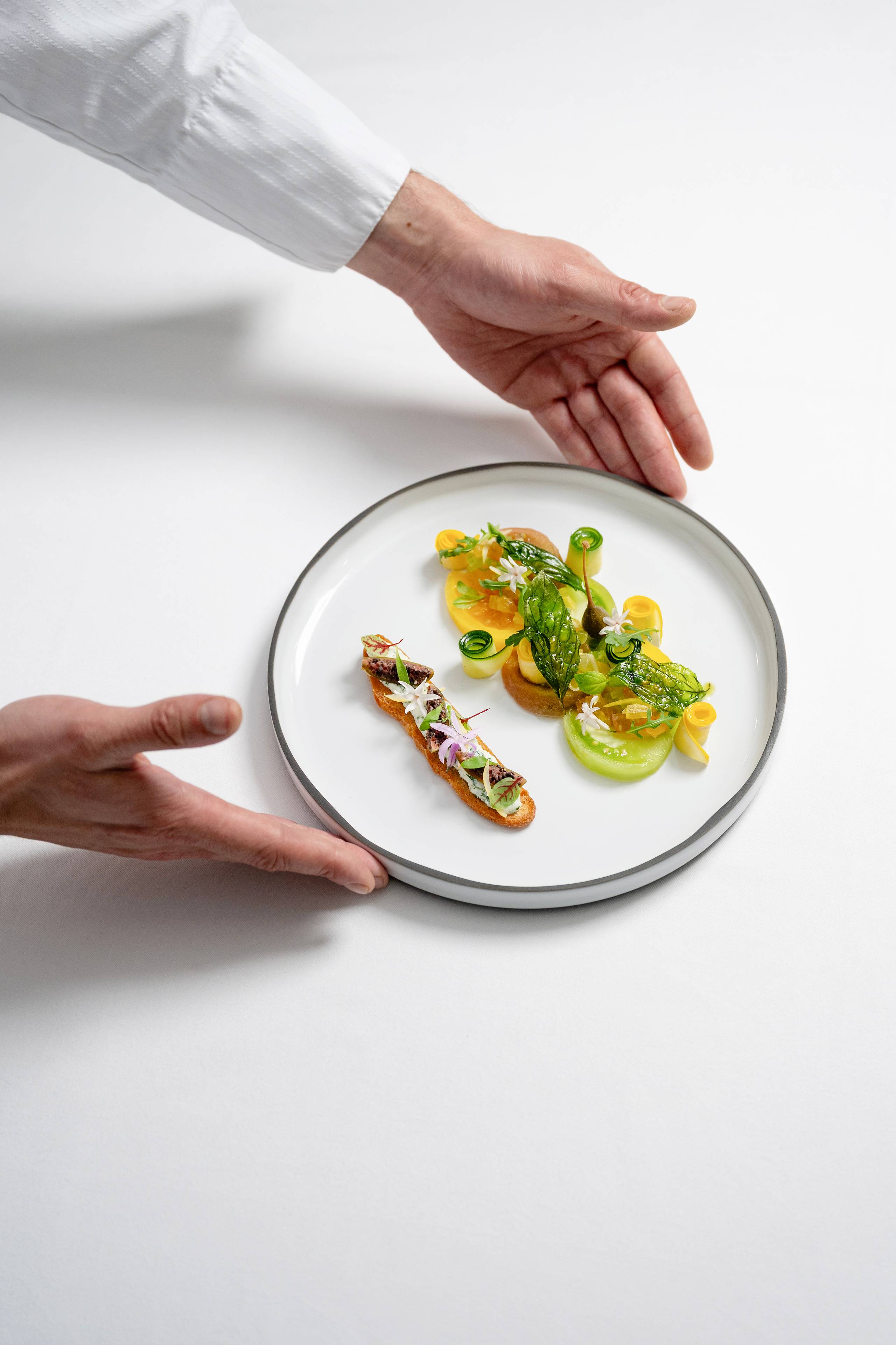Heirloom tomato salad with garlic toast and ewe’s cheese